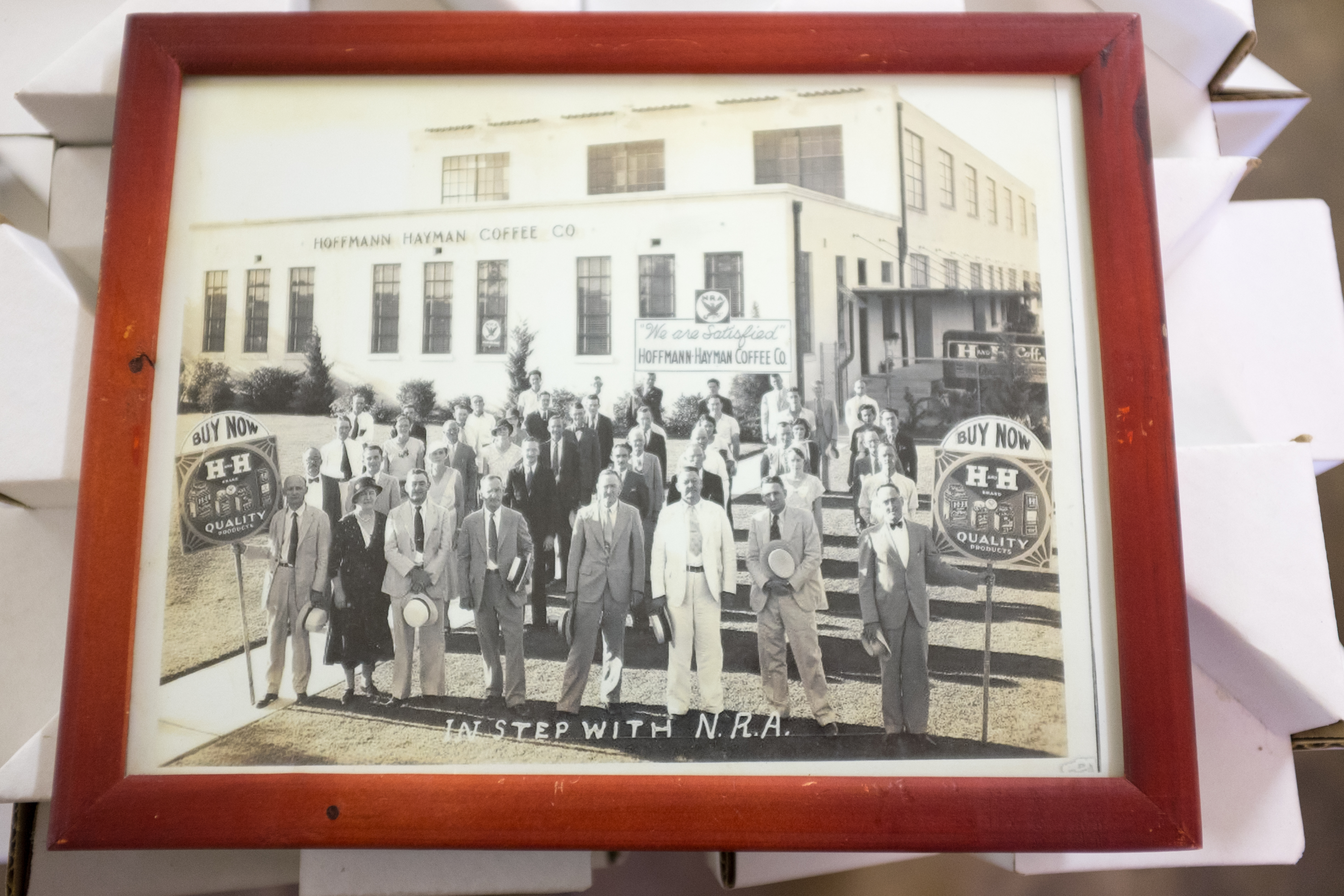 H and H factory — Menger / Hoffmann family group with staff, 1930s 1930s Hoffmann–Hayman factory group photograph, family and staff, delivery vehicle at loading dock, Delaware Street building