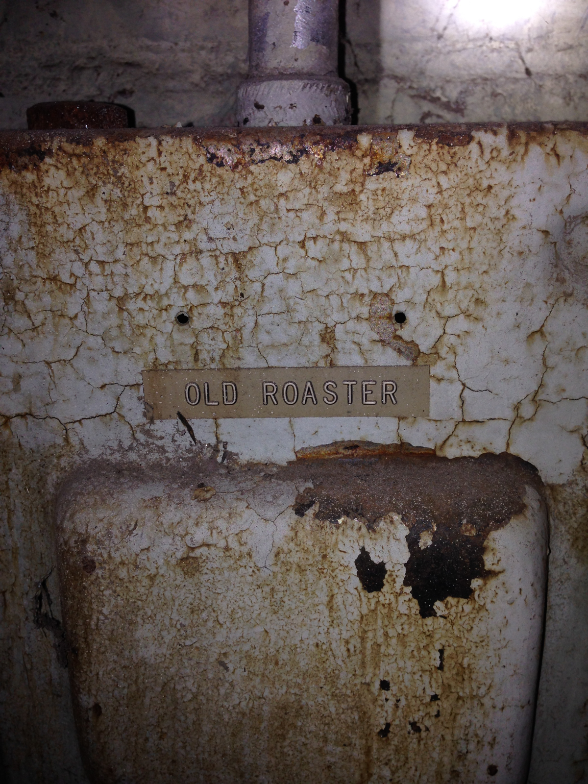 'OLD ROASTER' nameplate on the motor-starter cabinet — 601 Delaware Street, c. 1950s plant electrical OLD ROASTER — power distribution unit, 601 Delaware Street, second floor
