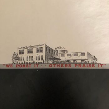 Close-up of the factory illustration at the foot of the letterhead: the two-story Hoffmann-Hayman Coffee Co. building labeled across the parapet, a row of parked H and H Coffee delivery trucks along the loading dock, foundation plantings and trees flanking the entrance, with the red "We Roast It · · Others Praise It" banner across the base.